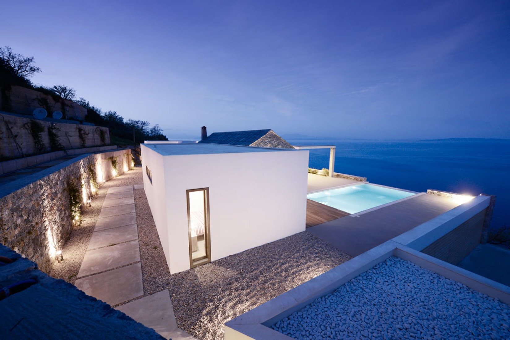 Outside view. Villa Melana by Valia Foufa and Panagiotis Papassotiriou. Photography © Pygmalion Karatzas.
