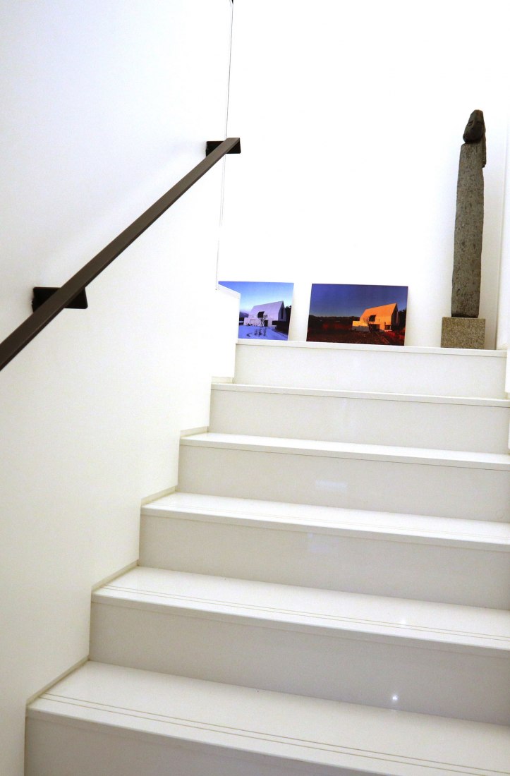 Stairs. House [in white] by AEV Architectures. Photograph by Hyunjune Lee