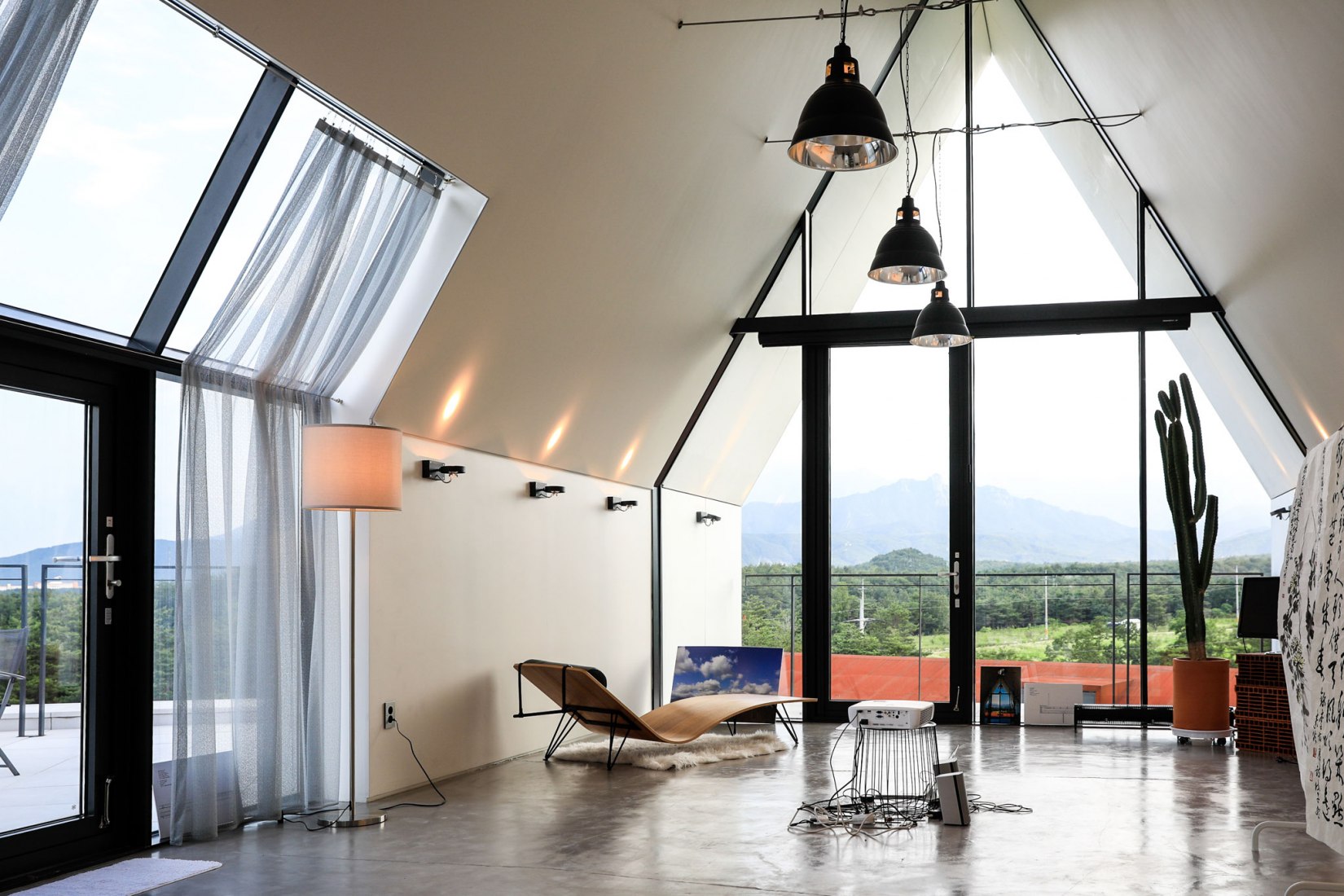 Interior. House [in white] by AEV Architectures. Photograph by Hyunjune Lee