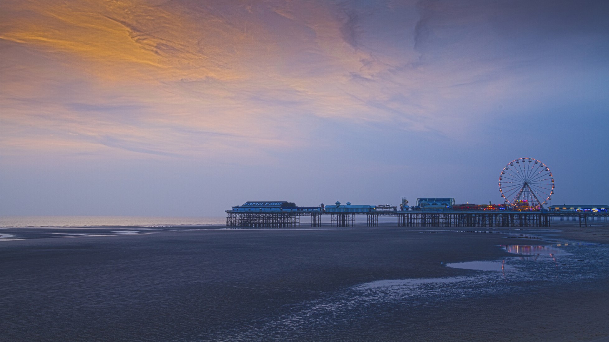 Blackpool Central Pier Sunset. Photograph by Flickr user Michael D Beckwith, licensed under public domain 