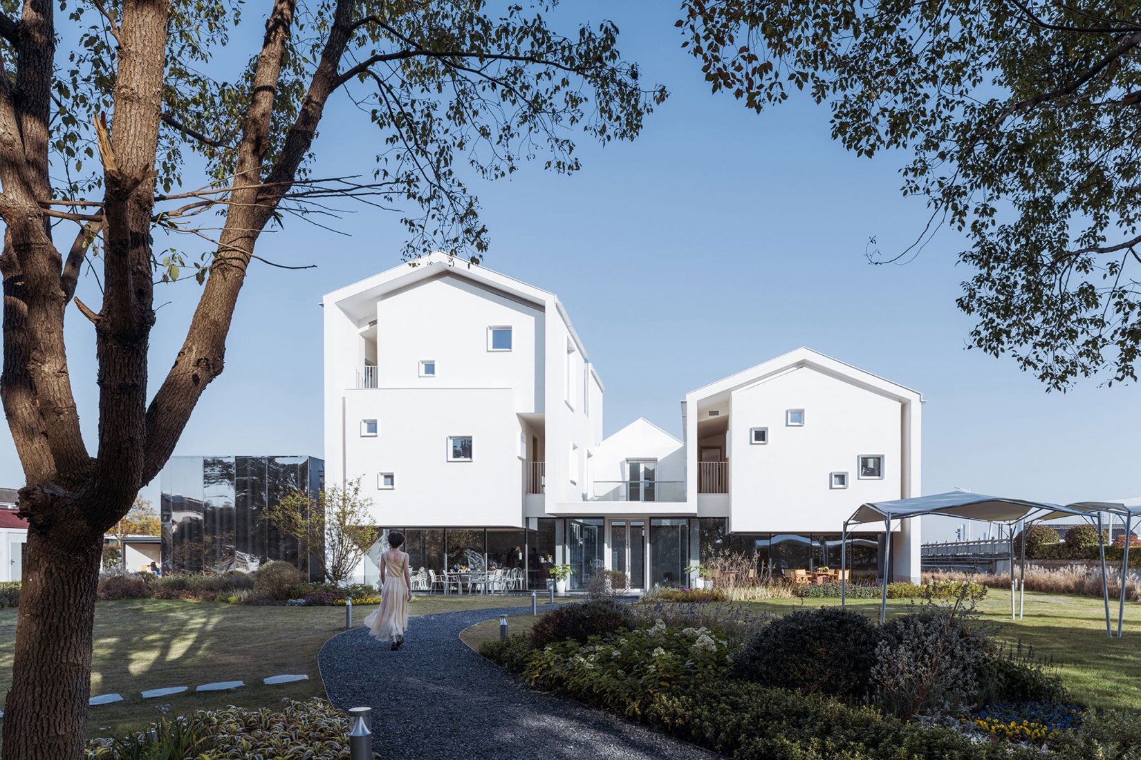 The White Suzhou Section Homestay por Wutopia Lab. Fotografía por CreatAR Images