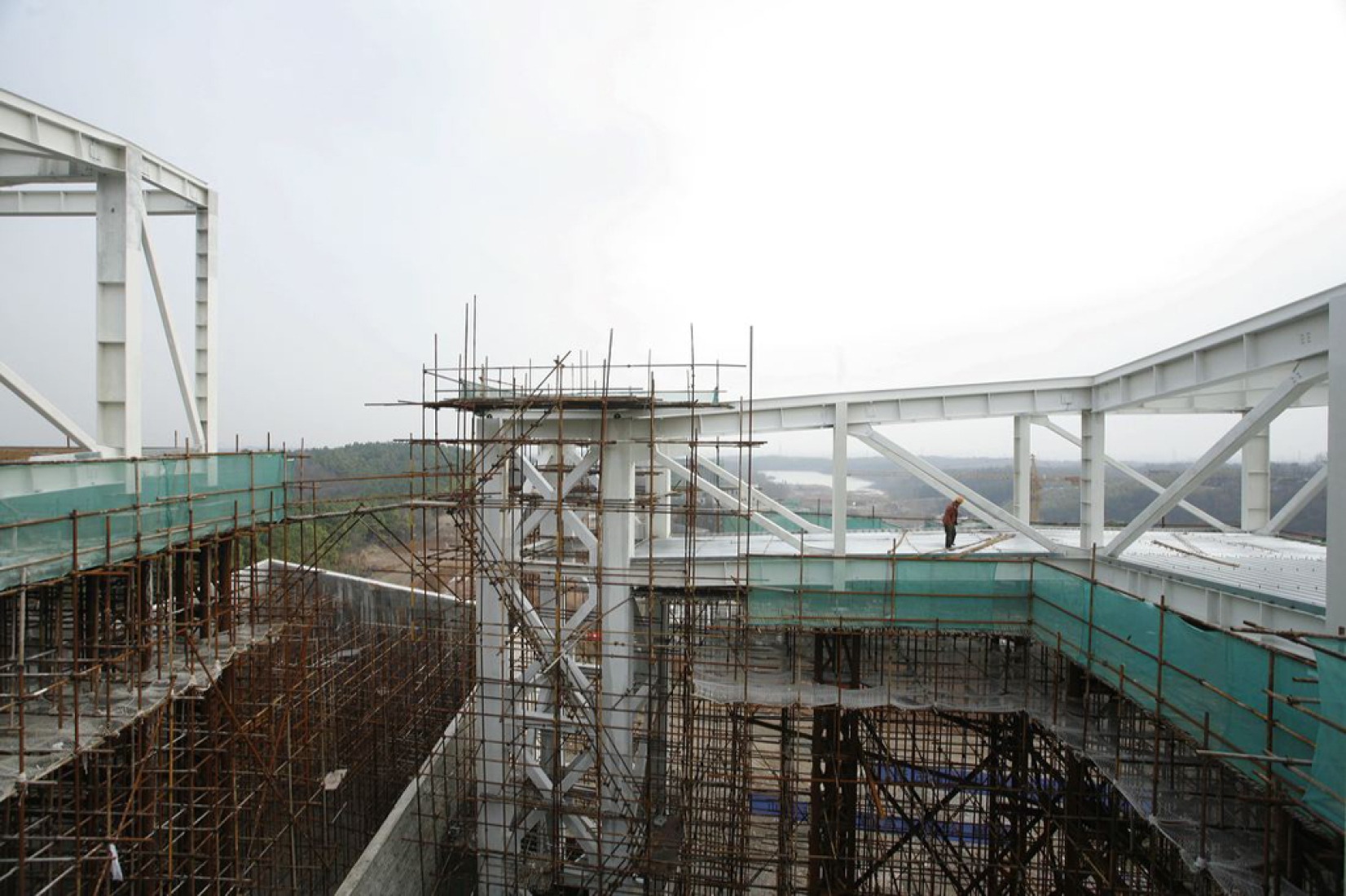 Construction, Nanjing Sifang Art Museum by Steven Holl. Photography © Iwan Baan. 