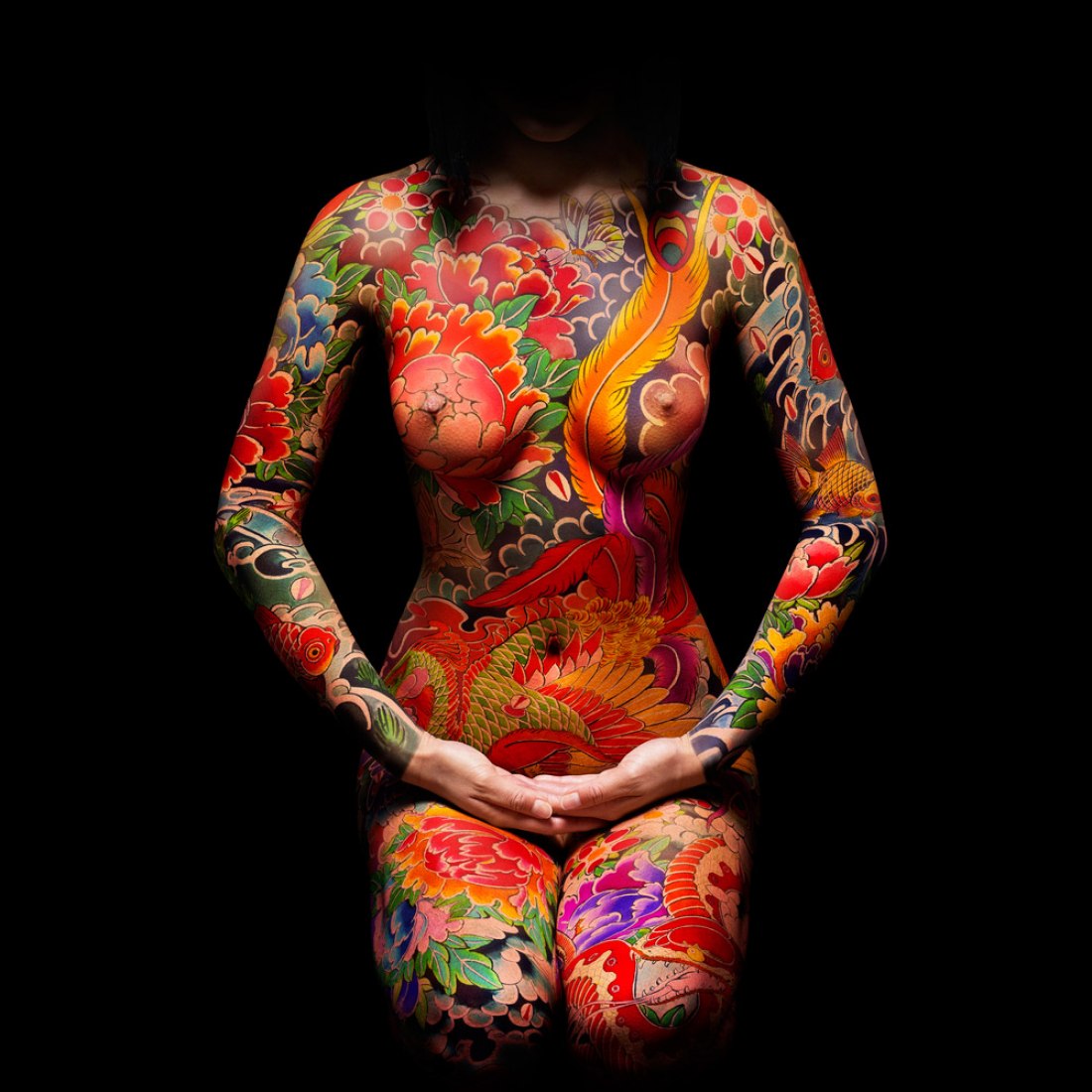 The artwork for Miss Kō's intricate and beautiful tattoos was created by Horikitsune (Alex Kofuu Reinke), the only European to have trained as an apprentice in the traditional Japanese art of Irezumi. He studied for more than 15 years in Japan under of the world-renowned Irezumi artist Horiyoshi III. Photography by celebrity and fashion photographer Uli Webber.