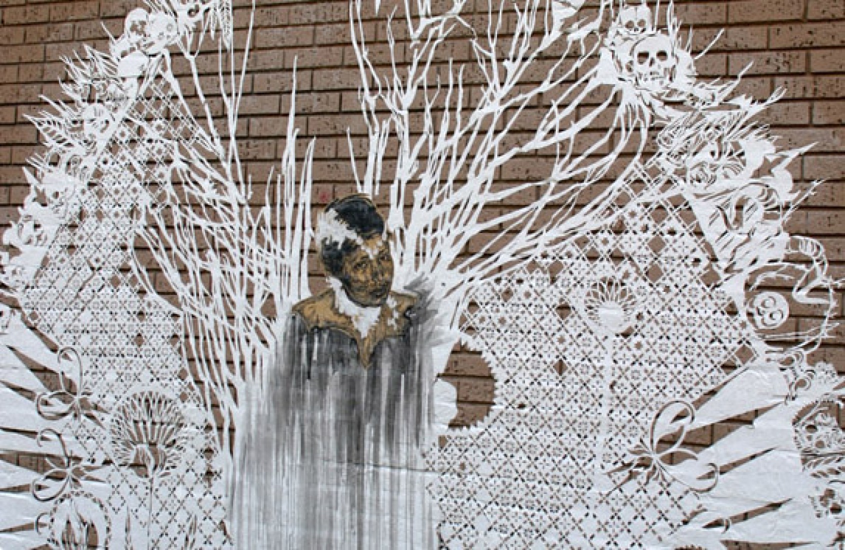 Mural de papel por Swoon.