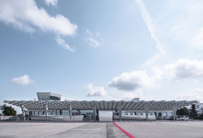 Prague Airport Terminal 3 by ra15. Photograph by Petr Polák.