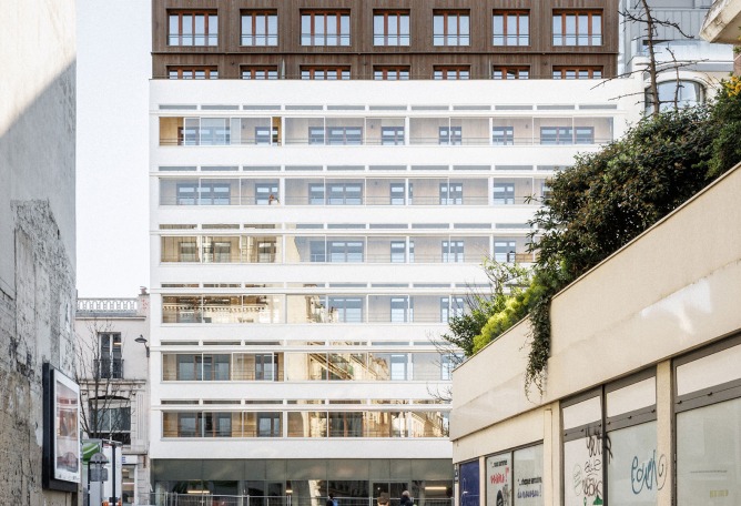 Garage Building into 63 Apartment Building by Atelier Tequi Architects. Photograph by 11h45 - Florent Michel.