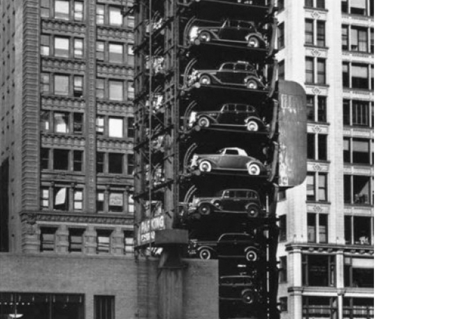Elevator Garage with Parking Lot in Chicago, 1936, Photo by John Gutmann.