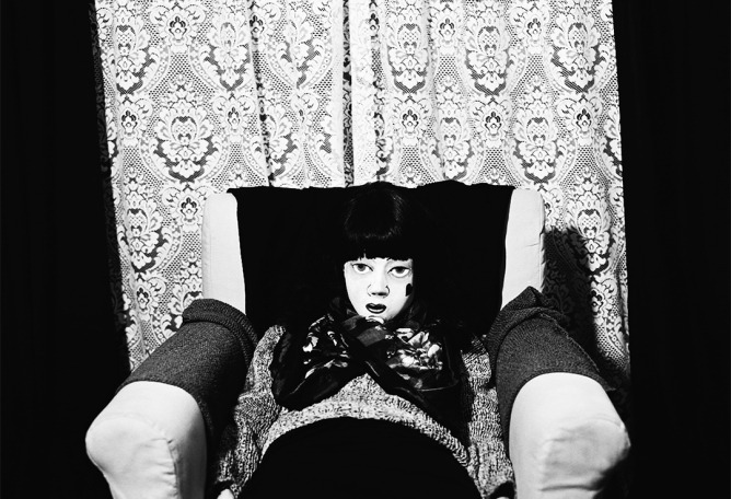 Doll Seated, 2013, Photographic print from negative. Photograph © Sarah Pucil. Courtesy of the Jersey Heritage Collections. 