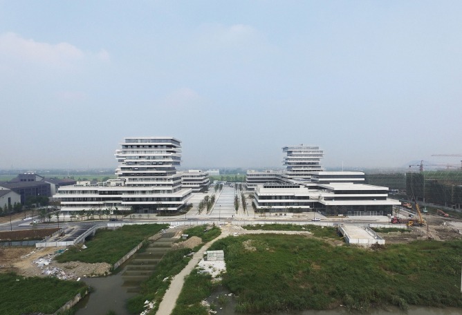 Aerial view. The Campus City for Hangzhou Normal University by WSP ARCHITECTS. Photograph © RUIJING Photography/Zhang Hui